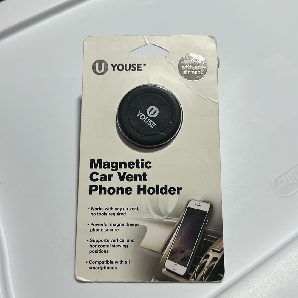 NIP CAR VENT PHONE HOLDER